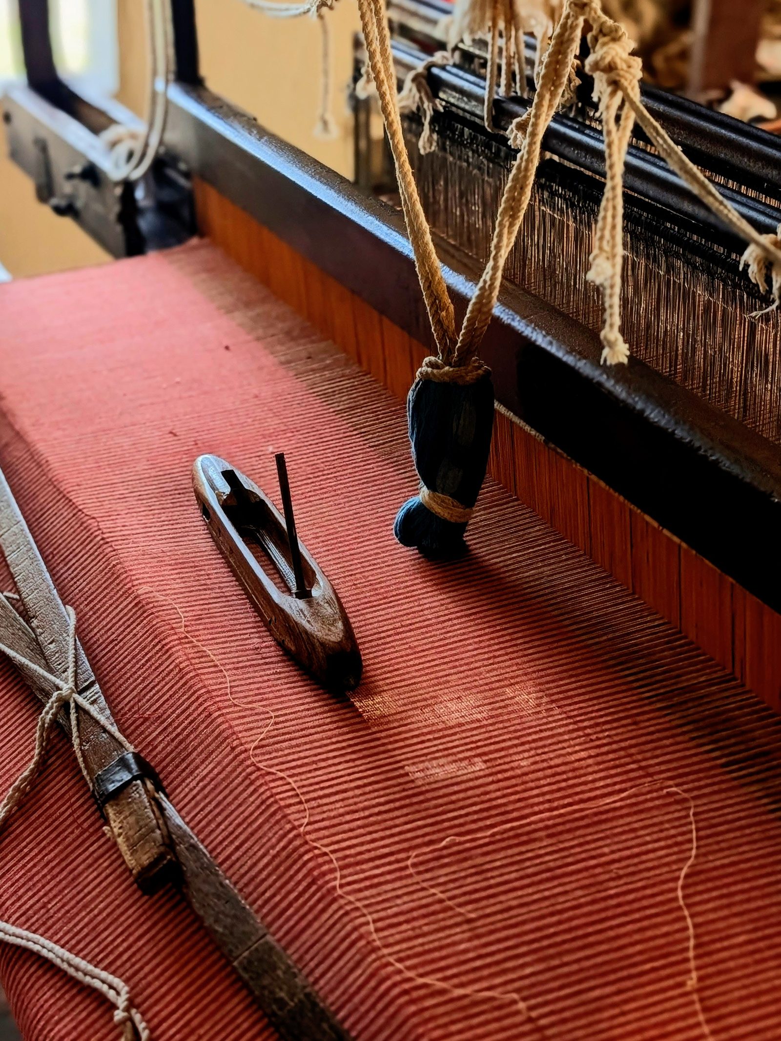 A bespoke saree being hand-block-printed in the Venkatadatta Weaves Bangalore studio, by the in-house printer